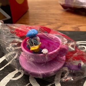 Donald Duck takes a ride on the Mad Tea Party Ride